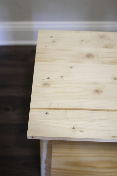 DIY hall tree bench seat attached to the bench frame with three wood screws