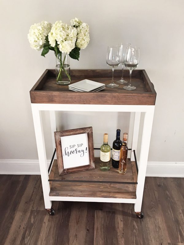 DIY bar cart with flowers, wine, and wine glasses