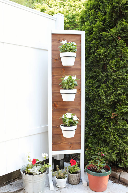 DIY Vertical Planter Stand with minwax english chestnut stain on cedar wood