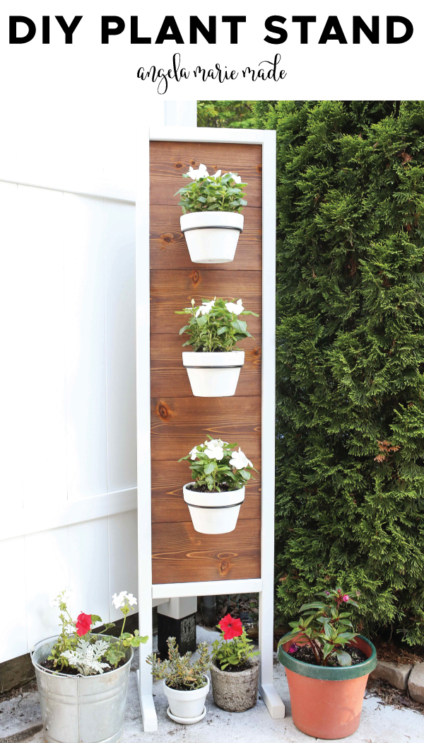 diy wood plant stand with white flowers