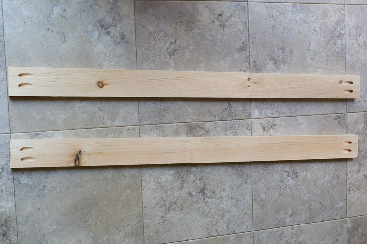 two 1x4 wood boards cut to 36.5 inches long with pocket holes on each end