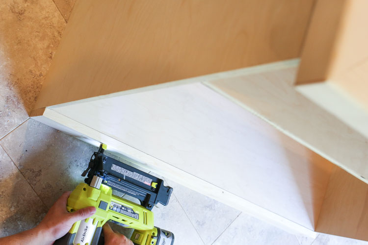Attaching Bottom trim to DIY TV stand with brad nailer