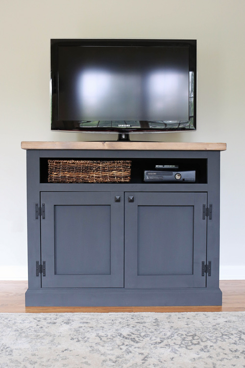TV in living room on a DIY Rustic TV Stand Media Console