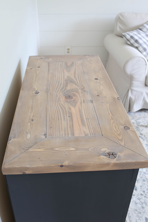 Weathered wood finish top of a DIY TV stand