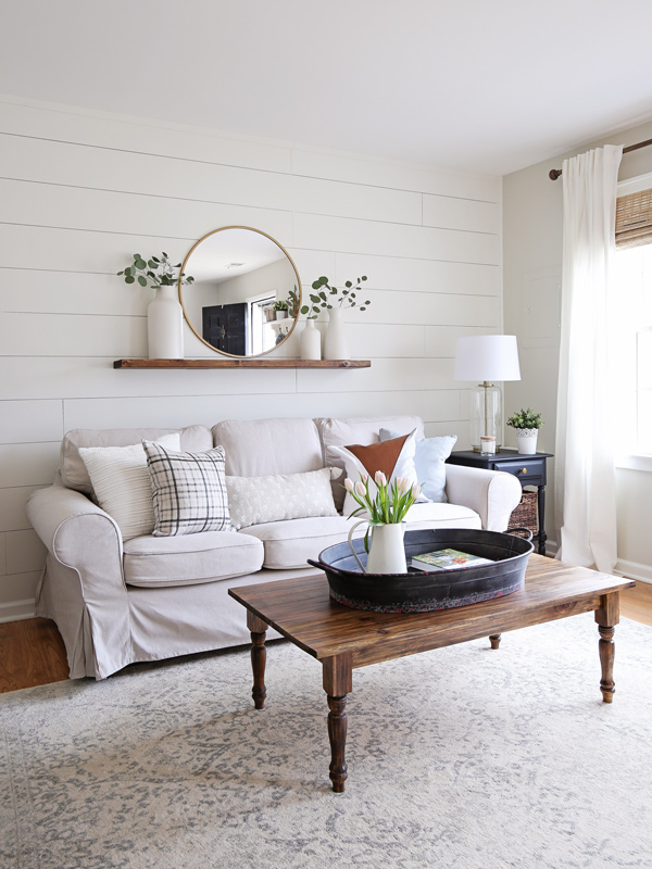 Living Room Makeover with shiplap wall painted white dove by benjamin moore