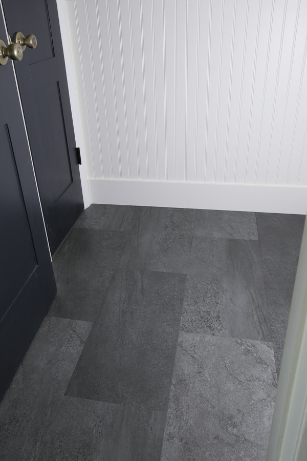 Gray slate luxury vinyl tile in DIY bathroom renovation