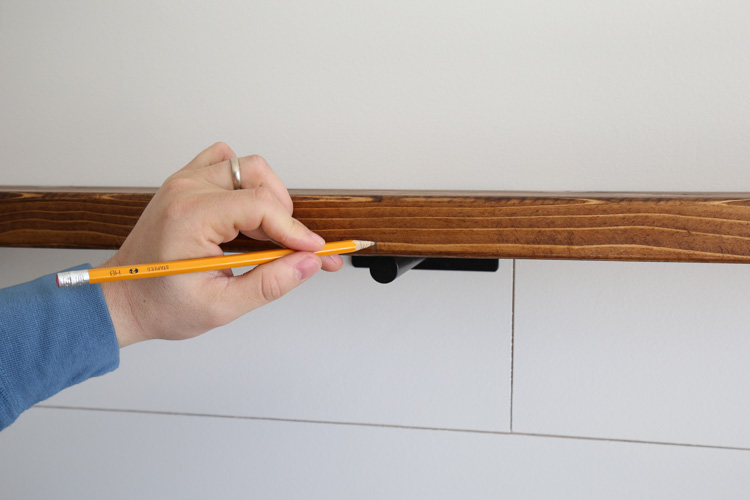 Marking floating shelf where bracket centerpoint is located