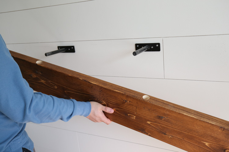 easy DIY floating shelf with two holes before installing on wall