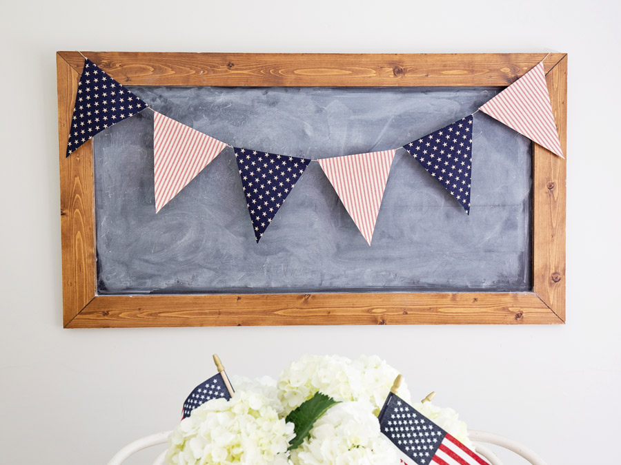 American Flag banner on chalkboard