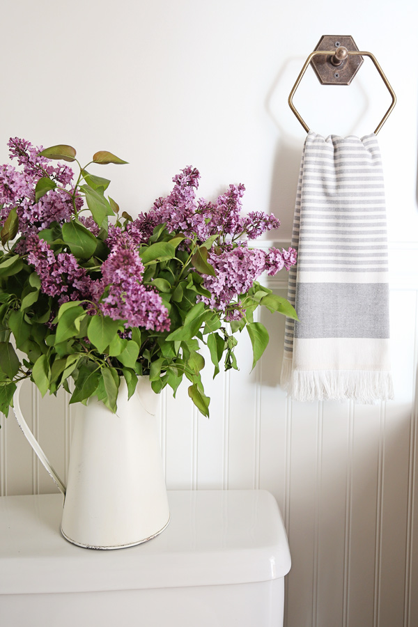 lilacs in bathroom