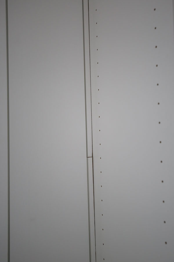 gap on bookcase edge from shiplap board