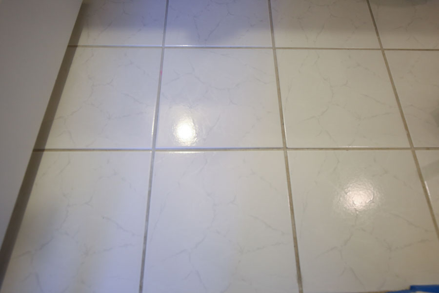 Old bathroom tile floor before painting