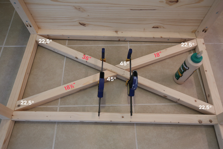 Attaching X style legs to DIY makeup vanity with wood glue and clamps