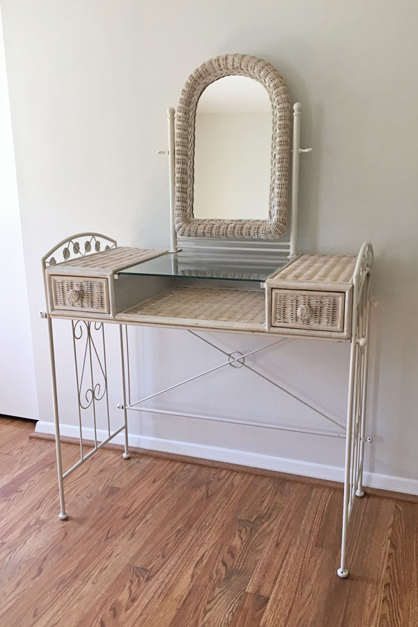 Old, white wicker vanity that inspirted this new makeup vanity build