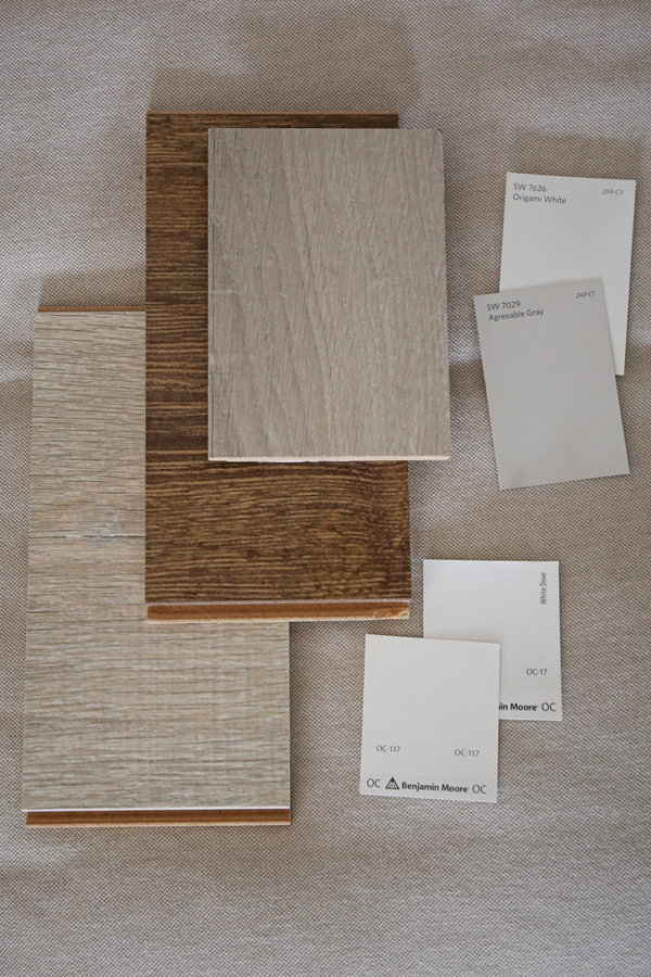 Comparing flooring, fabric, decor, and paint color swatches