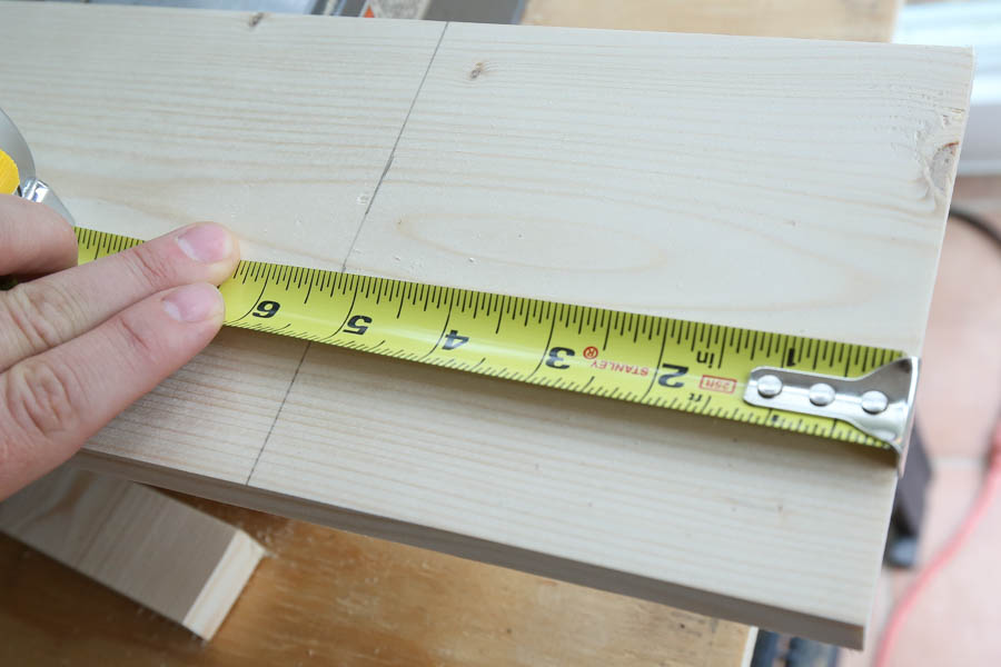 To create the L shape cut out for the window sill, mark 5 1/4" in from side of board