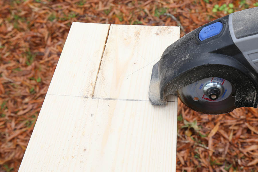 cutting new window sill edges with Dremel tool for DIY window trim