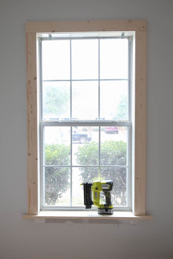 Add the 1x4 DIY window trim to the window top