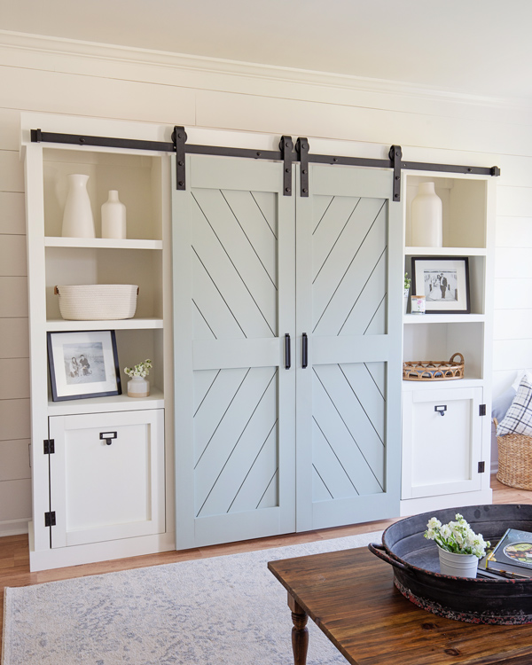 DIY double barn doors for a barn door entertainment center DIY in living room