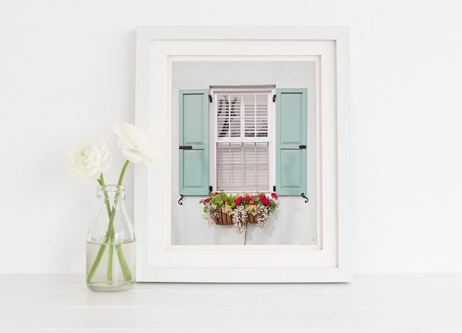 Framed photo of a Charleston window and flower box