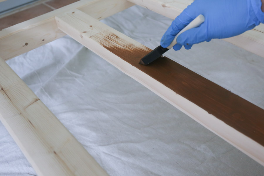 uaing a foam brush to apply stain to larger woood project