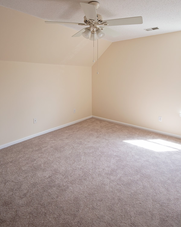 Bedroom before replacing carpet