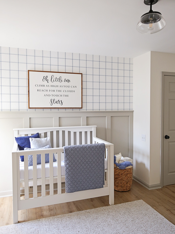 nursery accent wall with crib