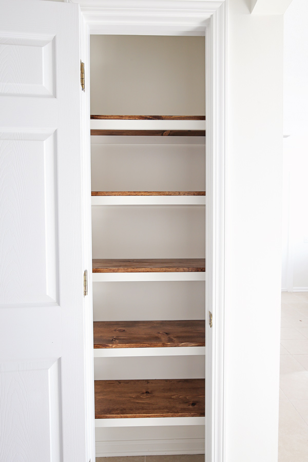 DIY Pantry Shelves with closet door open