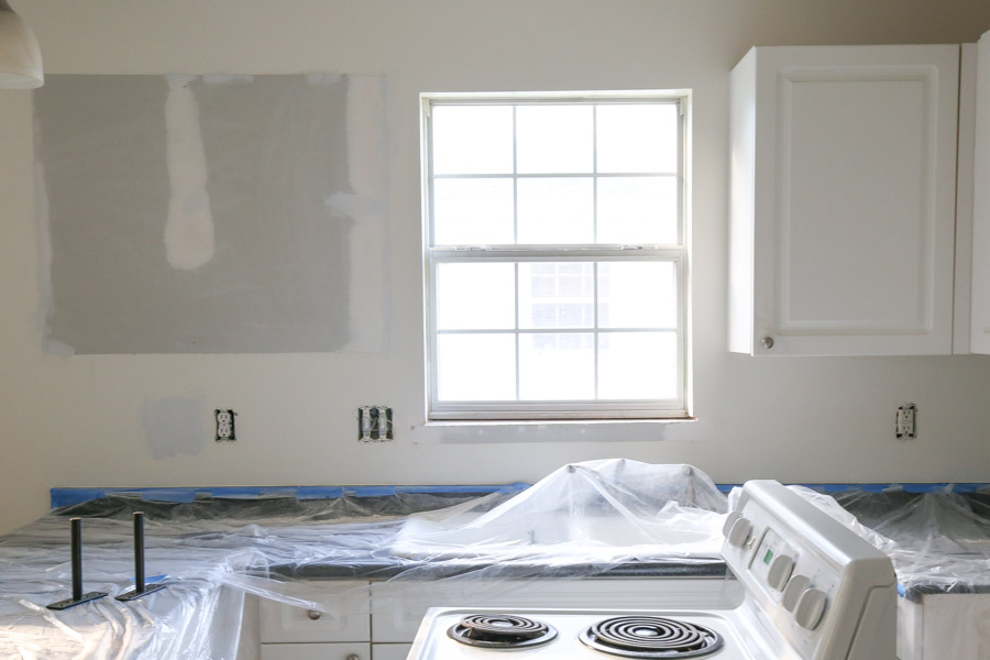 Upper cabinet removed from kitchen wall