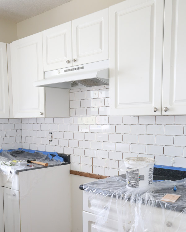 tile before grout on kitchen wall