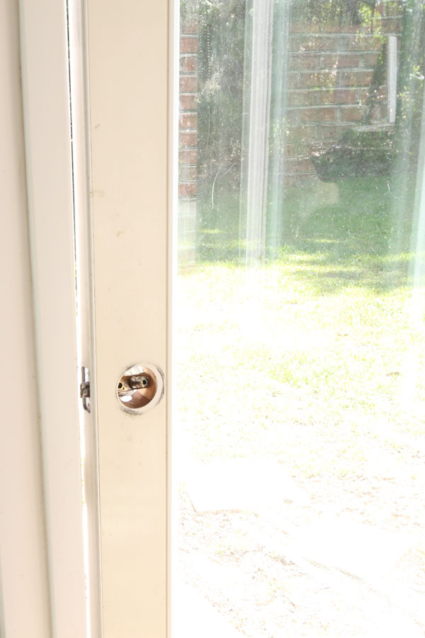 remove doorknob before painting metal door