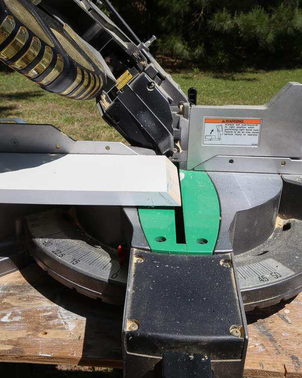 cut baseboard with a bevel cut using a miter saw