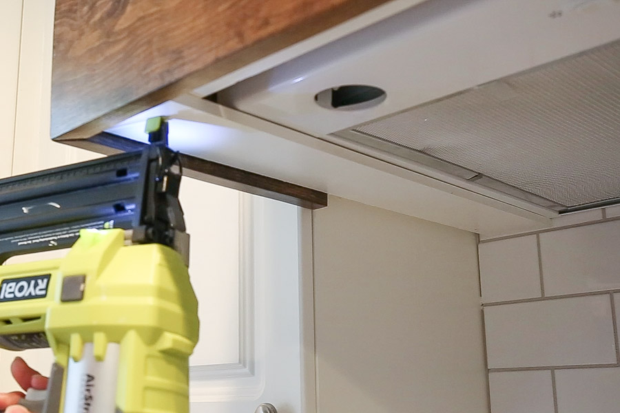 Finish the underneath side of the range hood cover and nail wood up