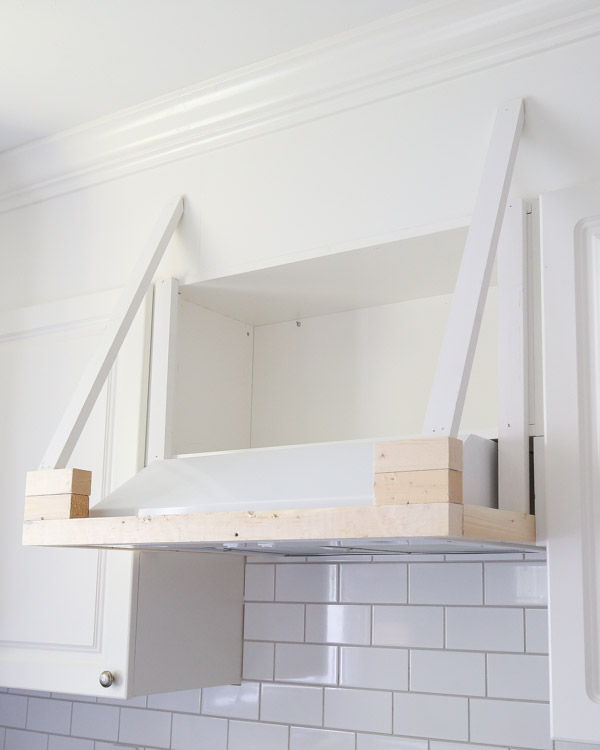 Add angle frame supports to range hood frame