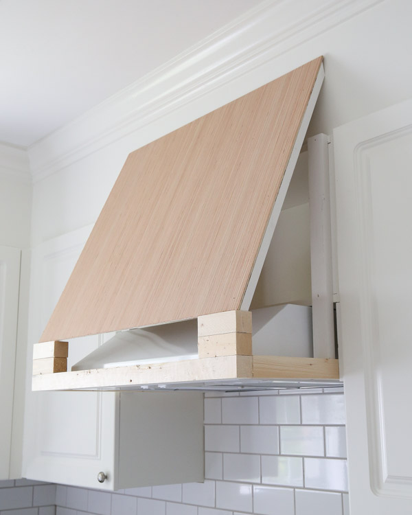 Attach plywood range hood cover for the front