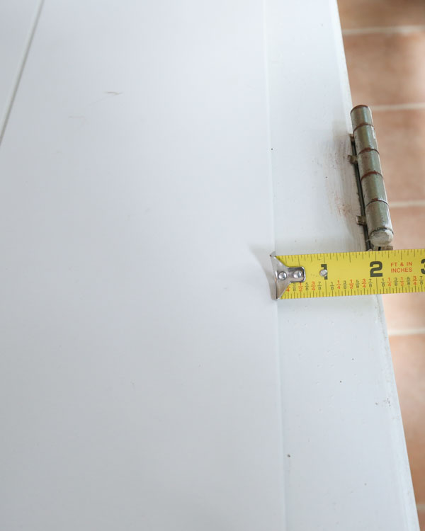 measuring extra space between shiplap boards and door hinges