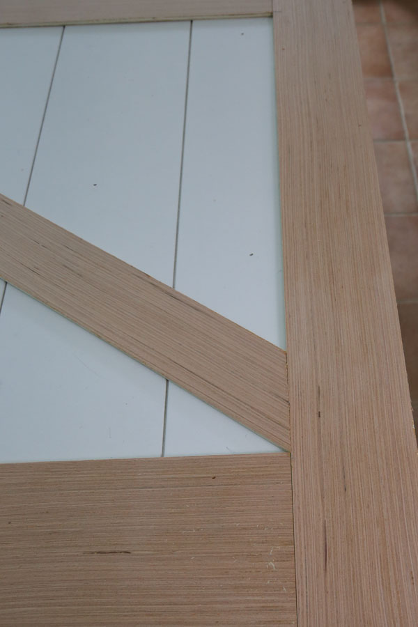 installing angled barn door trim boards