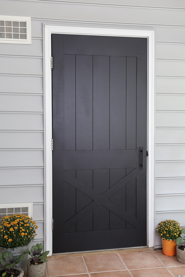 DIY faux barn door with quarter inch thick MDF shiplap