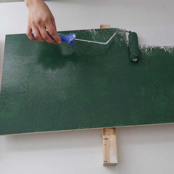 painting the diy wooden christmas sign green