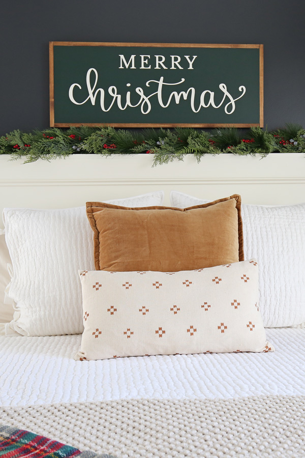 Wood DIY Christmas sign in cozy bedroom