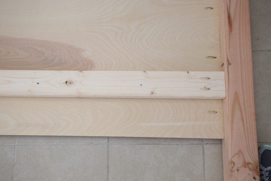 attaching 2x4 frame supports to 4x4 headboard sides