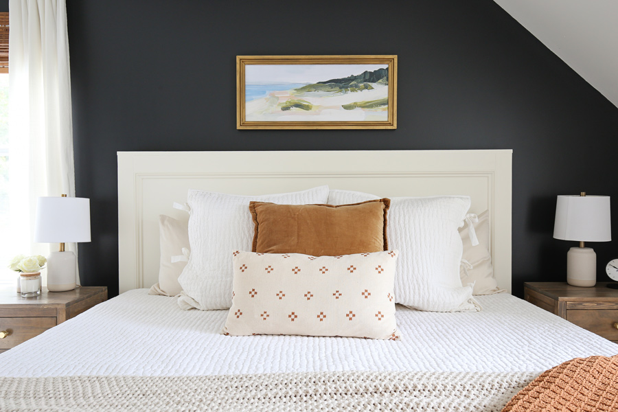 cozy white, brown, and natural bedding in DIY bedroom makeover