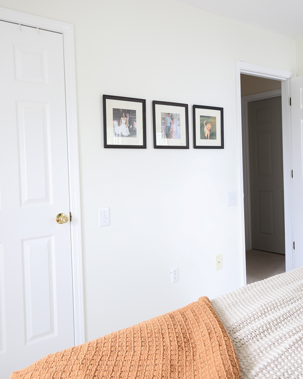 square frames on bedroom wall