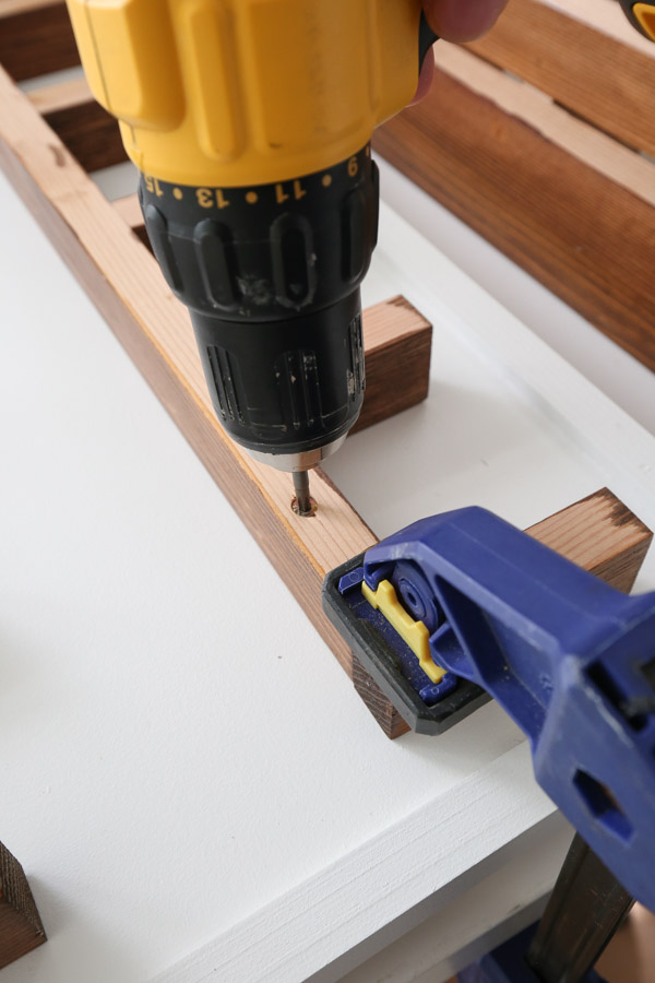 attach cubby shelves to plywood with drill