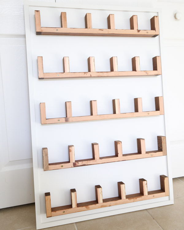 cubby shelves attached to DIY wood advent calendar before fronts are attached
