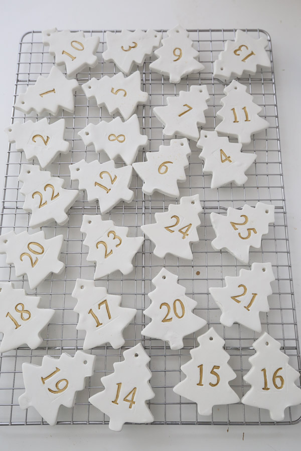 DIY clay ornaments with numbers for advent calendar and numbers painted gold
