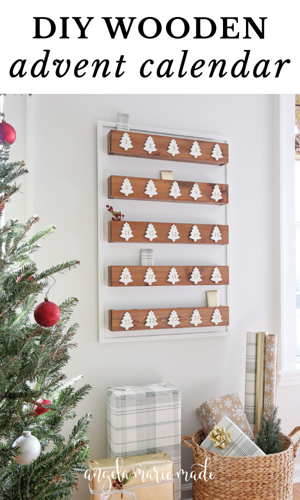 diy advent calendar wood on wall with gifts