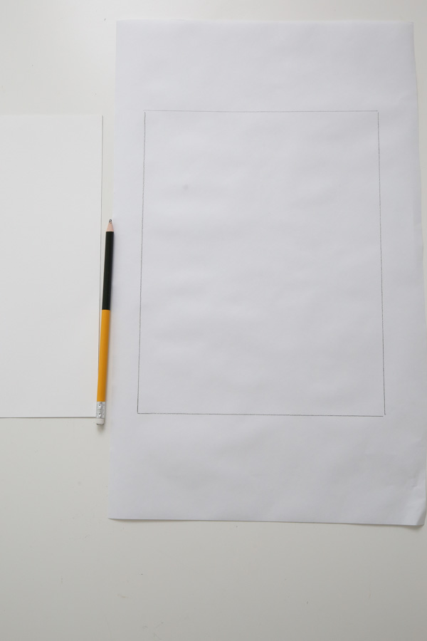 Trace the letter size paper on the freezer paper with a pencil