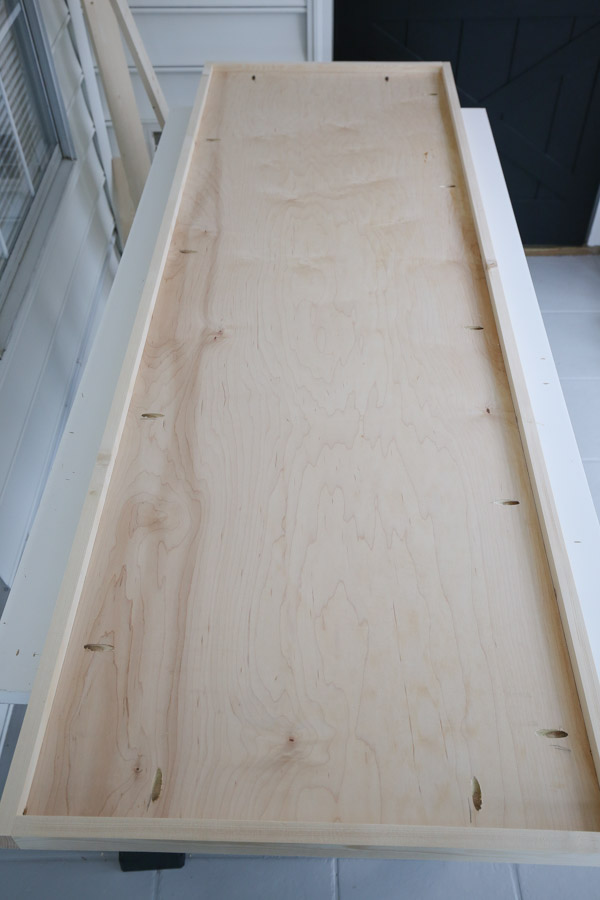 bottom view of workbench top after attaching 1x2 trim edge
