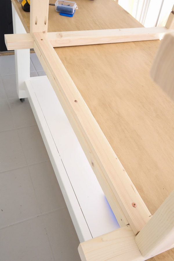 attaching 1x2 lower shelf support with screws